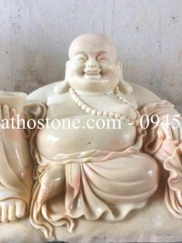 Tượng Phật Di Lặc cầm thỏi vàng và túi tiền đá vàng cà rốt